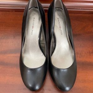 Black closed toed heels.